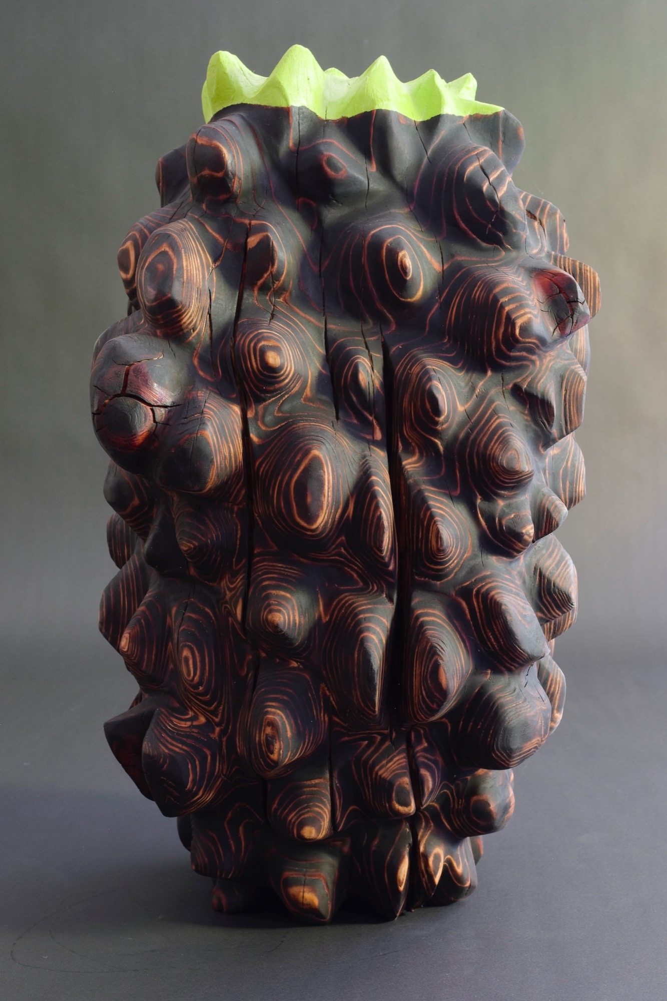 New Growth — a charred redwood sculpture.